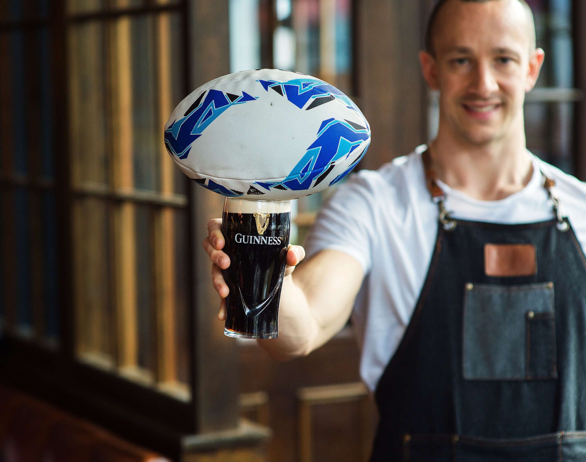 Rugby ball and pint of Guinness at The Duke of Wellington in Notting Hill